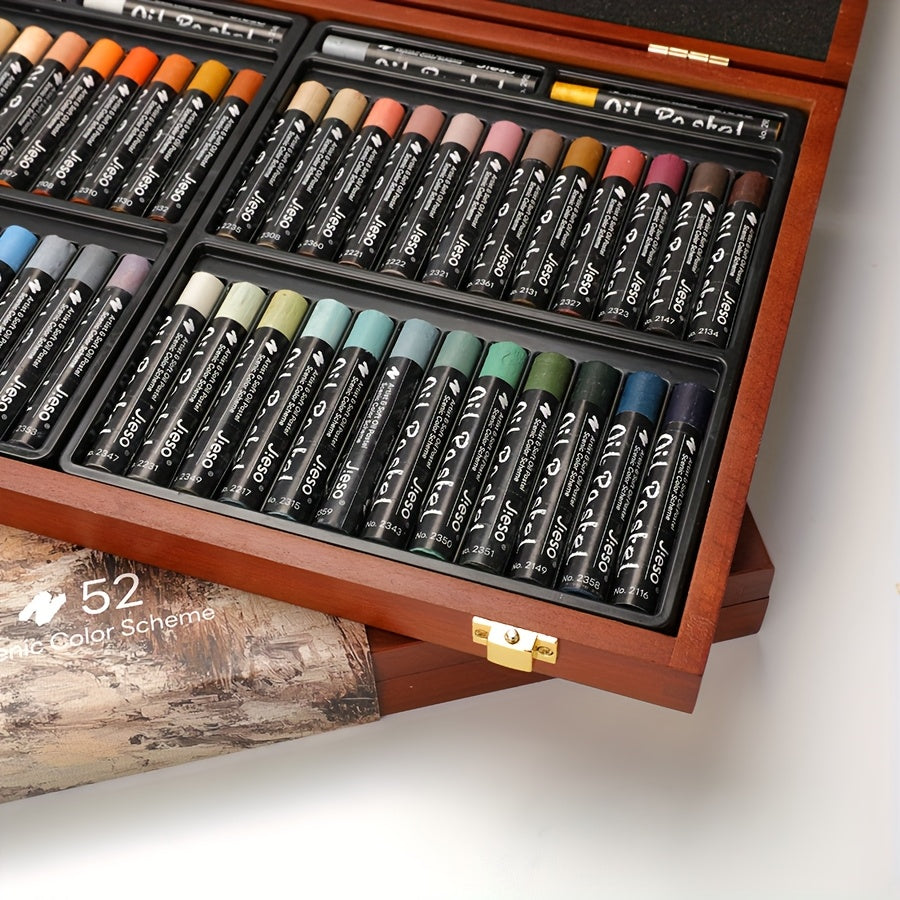 This JIESO 52pcs Wooden Gift Box Set of Soft Oil Pastels Features 51 Colors in a Rich Artistic Landscape Palette, Including White, Golden, and Silvery Bonus Sticks. These Medium-sized Art Crayons Are Suitable for Painting, Sketching, and Blending